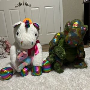 unicorn and dinosaur big plushies comes attached with smaller versions